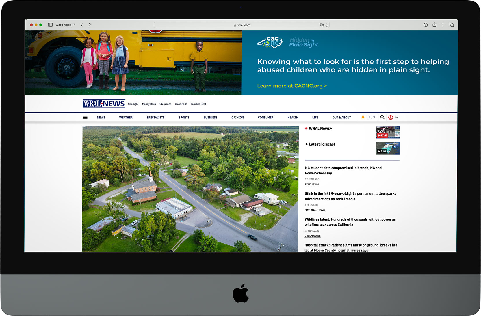 iMac showing WRAL website with CACNC advertisement
