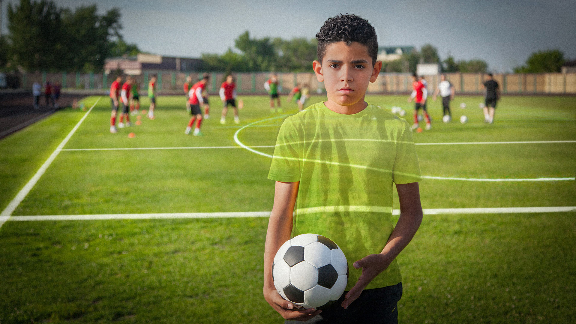 Photo of kids playing soccer